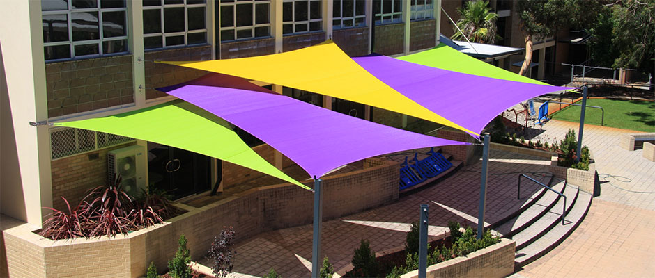green, purple, yellow shade sails